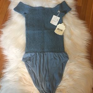Off the shoulder body suit